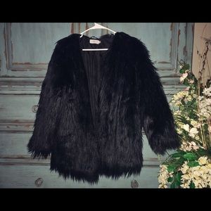 Black faux fur coat